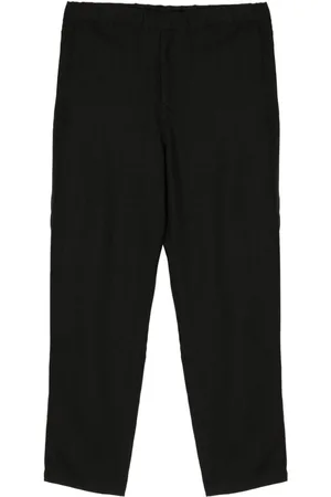 UNDERCOVER Elasticated tapered trousers