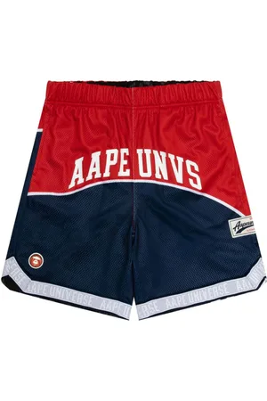 A Bathing Ape Mix-print reversible track shorts