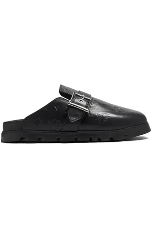 MCM Monogram leather flat mules