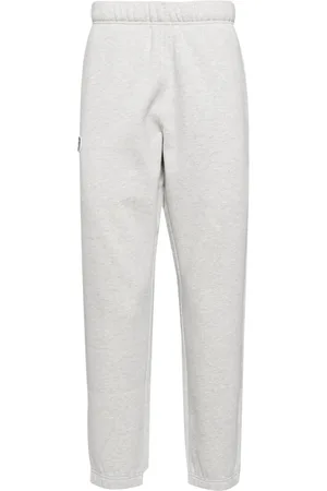 A Bathing Ape Moonface logo track pants