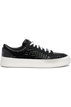 GCDS Patent-monogram sneakers