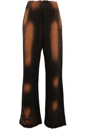We11 Done Distressed track pants