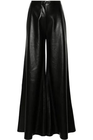 Nanushka Flared faux-leather trousers