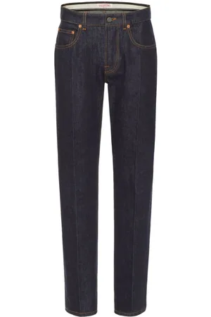 VALENTINO GARAVANI Logo-appliqué tapered-leg jeans