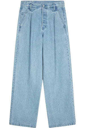 DRIES VAN NOTEN Pleated wide-leg denim trousers