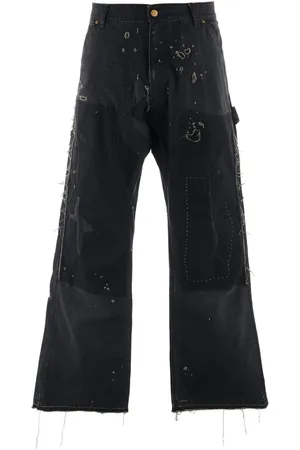 SAINT MXXXXXX Distressed wide-leg jeans