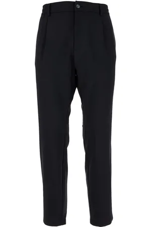 CRUNA Pleated trousers