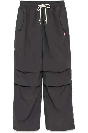 A Bathing Ape Moonface logo utility pants