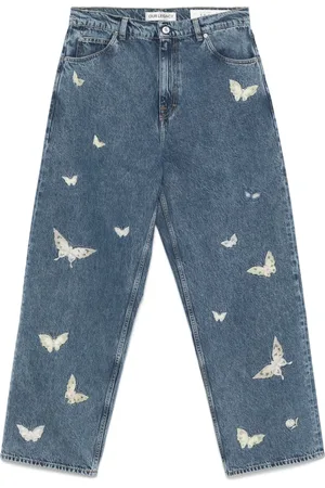 OUR LEGACY Butterfly-embroidered jeans