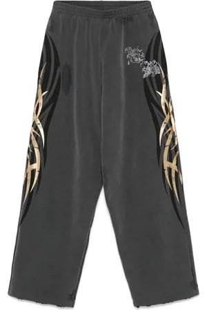Balenciaga Tacky gold-print track pants