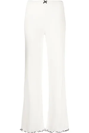 ROTATE Pointelle-knit flared leggings