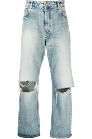 Balenciaga Distressed low-rise wide-leg jeans