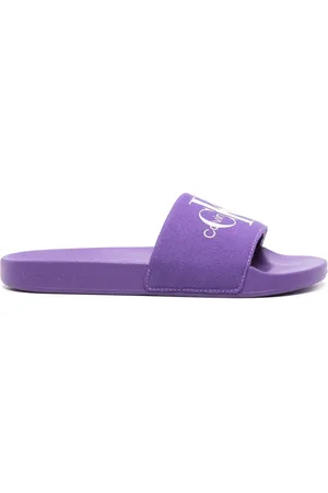 Calvin Klein Logo-print canvas slides