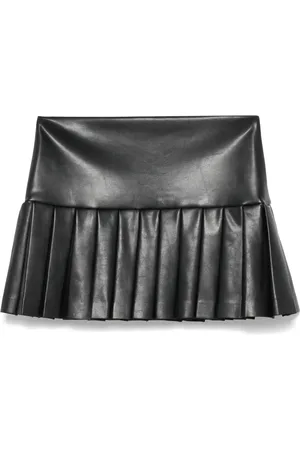 Norma Kamali Pleated pickleball skirt