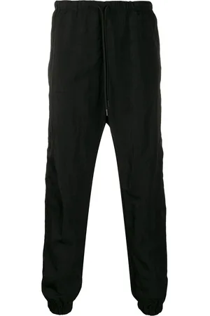 MARCELO BURLON Cross track pants