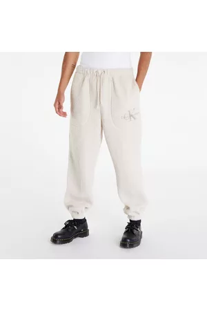 Calvin Klein Tepláky - Relaxed Sherpa Joggers UNISEX Cream