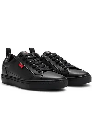 HUGO BOSS Faux-leather trainers with red logo flag