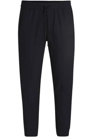 HUGO BOSS Tapered-fit trousers in water-repellent stretch fabric