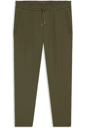 HUGO BOSS Tapered-fit trousers in water-repellent stretch fabric