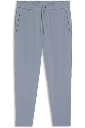 HUGO BOSS Tapered-fit trousers in water-repellent stretch fabric