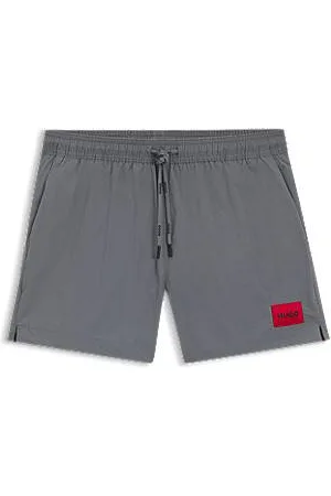 HUGO BOSS Fully lined swim shorts with red logo label