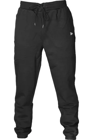 New Era Černé tepláky Essentials Joggers 60416741