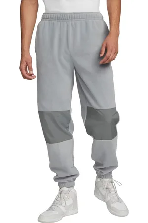 Nike Šedé pánské tepláky Club Fleece Pant DQ4901-073