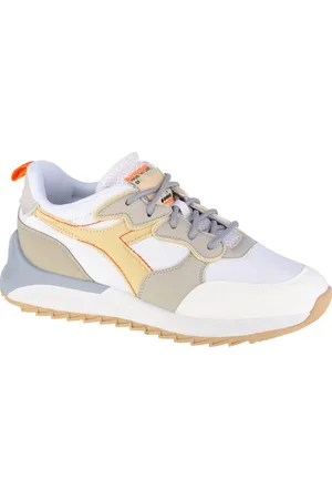 Diadora Bílo- žluté dámské tenisky Jolly Canvas Wn 501-178305-01-20006
