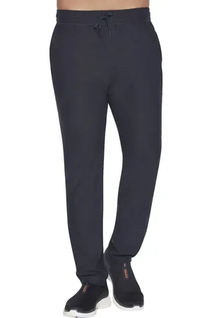 Skechers Tmavě modré pánské tepláky Ultra Go Lite Tapered Pant MPT108-NVY