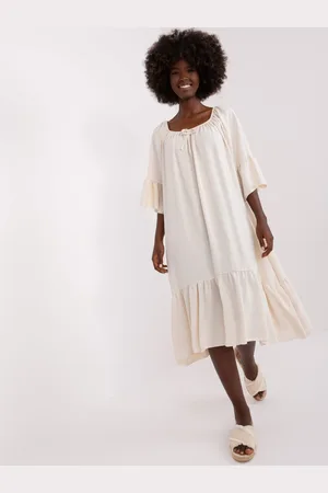 Italy Moda Světle béžové asymetrické oversize midi šaty s volánem DHJ-SK-6057.93-light beige