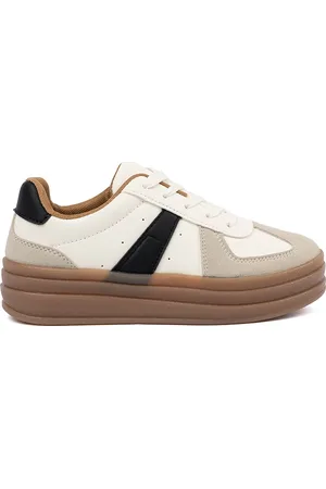 SHELOVET Béžovo-bílé dámské sneakersy s černými vsadkami X3032BE