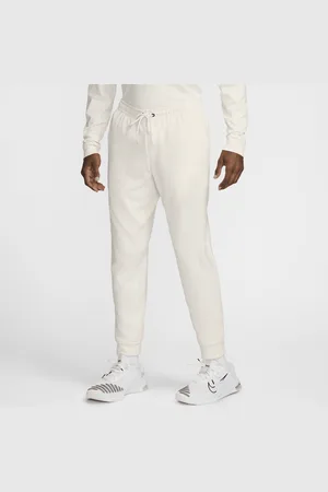 Nike Pánské funkční tepláky Primary Fleece Dri-FIT UV