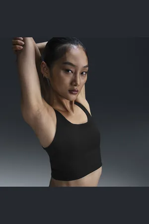 Nike Dámská žebrovaná prodloužená sportovní podprsenka s lehkou oporou a vycpávkami