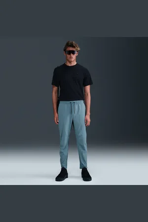 Nike Pánské všestranné kalhoty Dri-FIT Unlimited s manžetami na zip