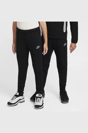 Nike Reflexní běžecké kalhoty Sportswear Tech Fleece pro větší děti