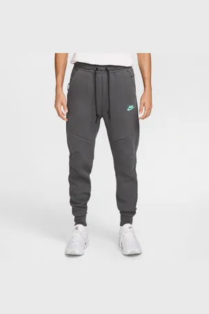 Nike Pánské flísové běžecké kalhoty Sportswear Tech
