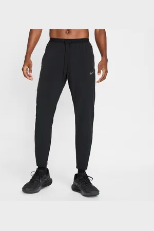 Nike Pánské tkané běžecké kalhoty Stride Dri-FIT