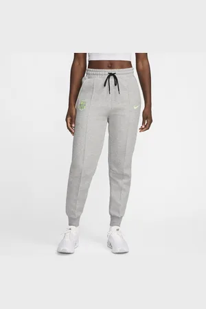 Nike Dámské fotbalové kalhoty FC Barcelona Tech Fleece se středně vysokým pasem