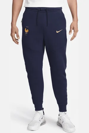 Nike Pánské fotbalové běžecké kalhoty FFF Tech Fleece