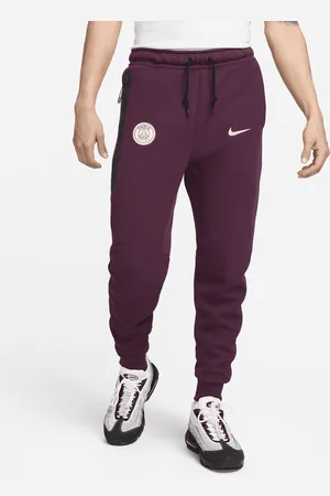 Nike Pánské fotbalové běžecké kalhoty Paris Saint-Germain Tech Fleece
