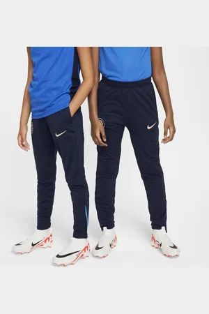 Nike Pleteninové fotbalové kalhoty Dri-FIT Chelsea FC Strike pro větší děti