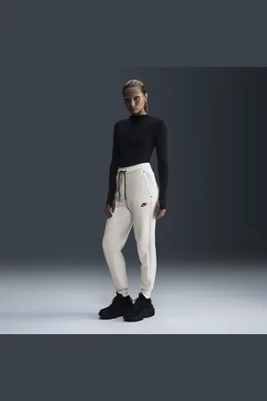 Nike Dámské běžecké kalhoty Sportswear Tech Fleece se středně vysokým pasem