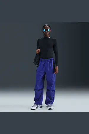 Nike Pánské volné tkané kalhoty Tech