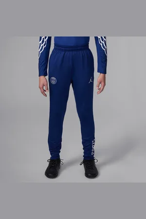 Nike Fotbalové čtvrté pleteninové tréninkové kalhoty Jordan Dri-FIT Paris Saint-Germain Strike pro větší děti