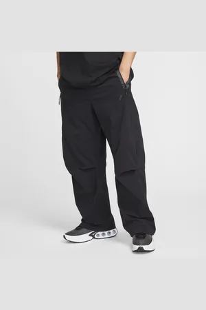 Nike Pánské volné tkané kalhoty Tech