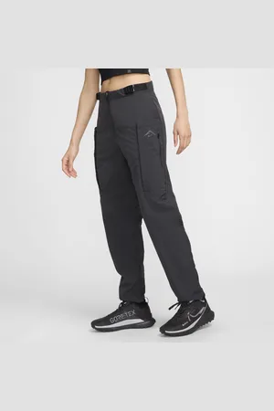 Nike Dámské běžecké kalhoty Trail Repel se středně vysokým pasem