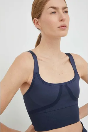 PUMA Sportovní podprsenka x VOGUE tmavomodrá barva