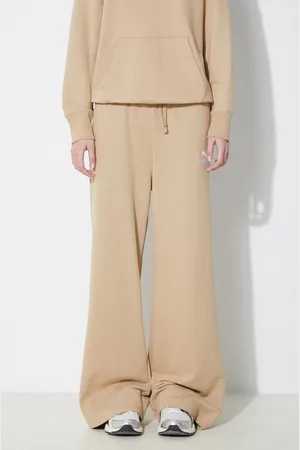 PUMA Bavlněné tepláky BETTER CLASSIC barva