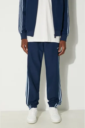 adidas Tepláky tmavomodrá barva