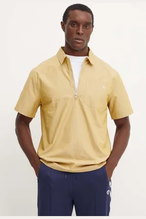 PUMA Bavlněné polo tričko MMQ barva